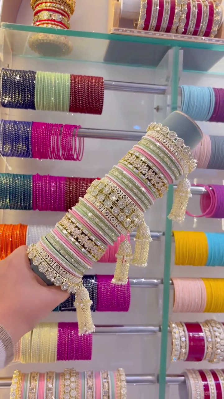 Festival of Colors Bangle Collection – Vibrant Pink, Green, Gold, and Tassel-Adorned Ornaments for Joyful Celebrations 🌸✨